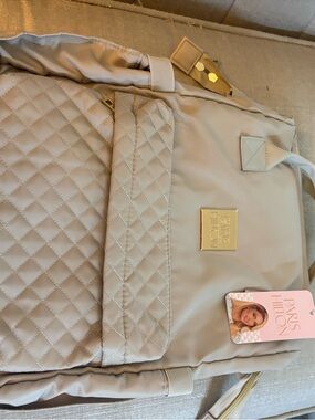 Paris Hilton Quilted Cream Backpack with Gold Accents